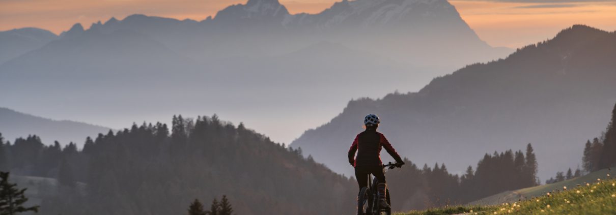 mountain bike at sunset in swiss alps
