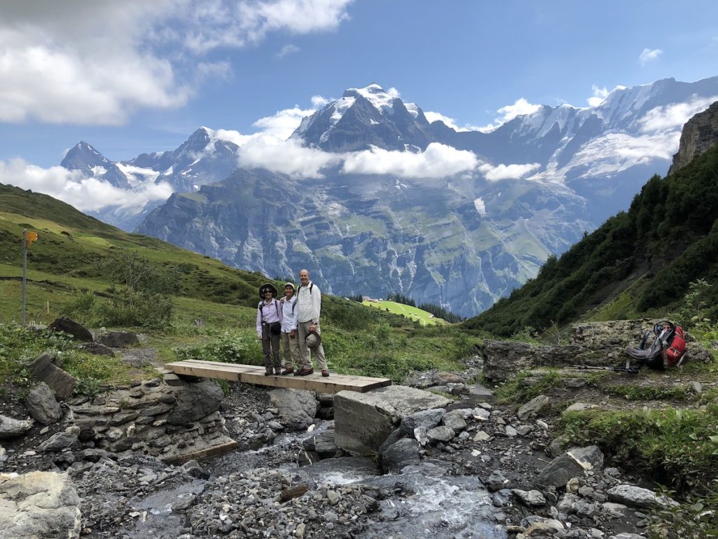 Hikers near Murren in Swiss Alps